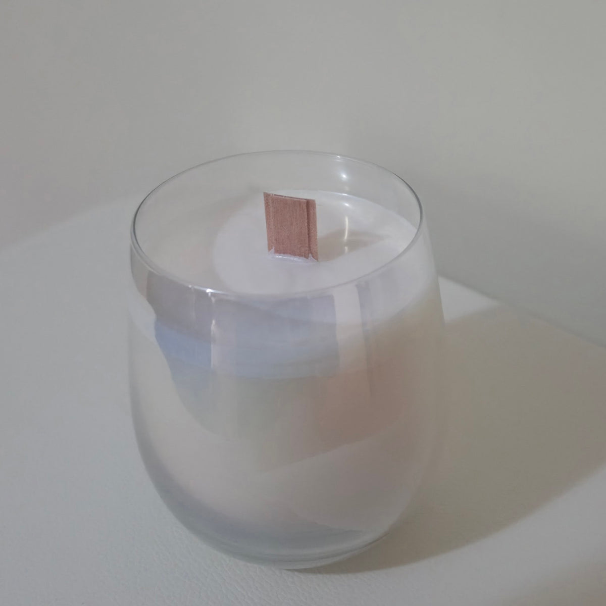 Serenus Spa Small cocosoy candle in a pearlised glass jar with white wax and a wooden wick.